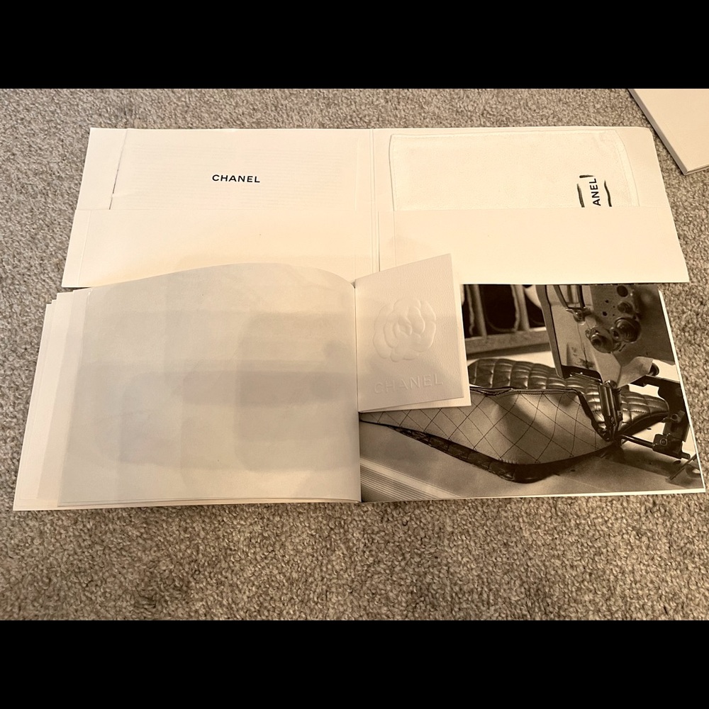 Chanel care booklet and Chanel receipt holder